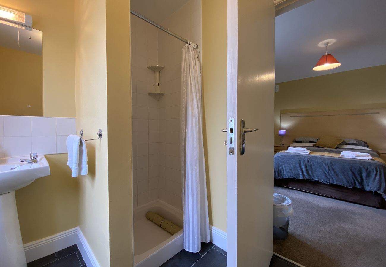 Clifden Glen Holiday Village No 11. Clifden Co Galway. En suite bathroom Double bed, contemporary comfortable decor.  Shower and WC