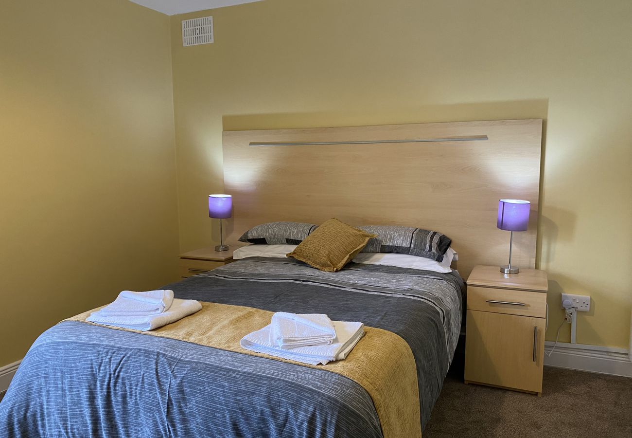 Clifden Glen Holiday Village No 11. Clifden Co Galway. Double bed, contemporary comfortable decor.